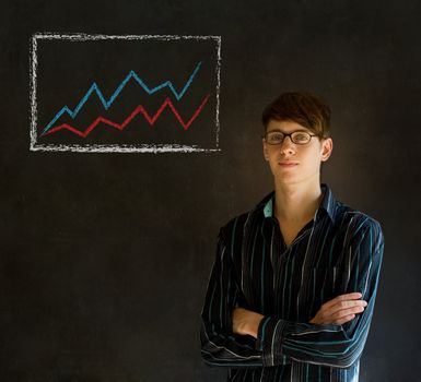 Confident business man or teacher with arms crossed against a blackboard background