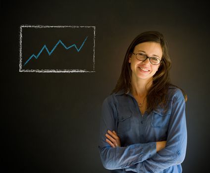 Confident business woman or teacher with arms crossed against a blackboard background