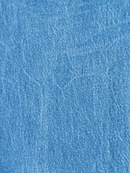 Striped textured used blue jeans denim fabric grunge background