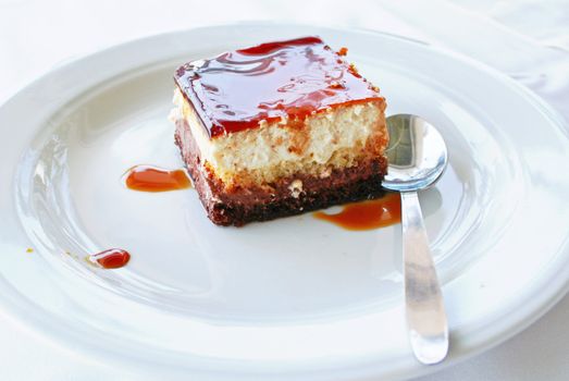 Dessert - Cheesecake with strawberry sauce and chocolate cream 