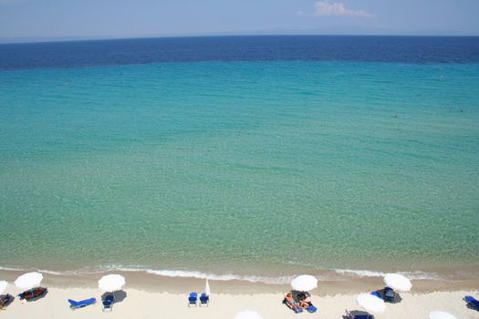 Greece. Halkidiki. Umbrellas on the beach 