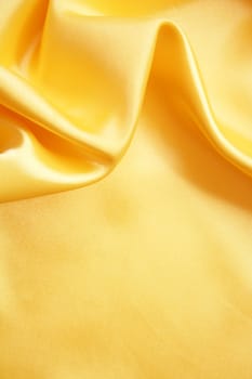 Smooth elegant golden silk can use as background 
