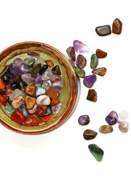 Colorful semiprecious stones on white background