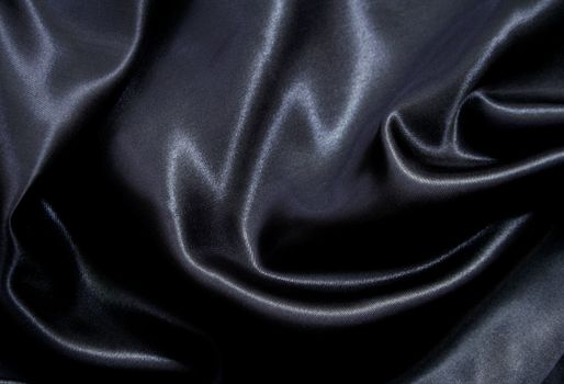 Smooth elegant black silk can use as background 
