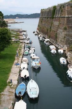 Greece. Corfu-town. Fortress and boats