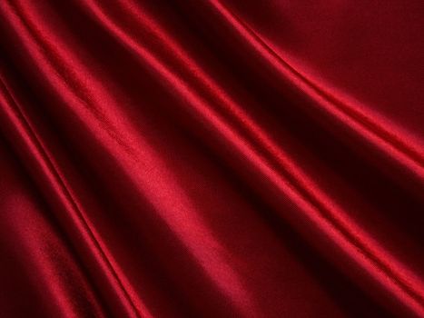 Smooth elegant red silk can use as background 