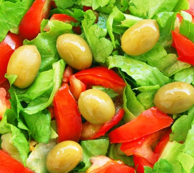 Healthy vegetarian Salad with olives as background