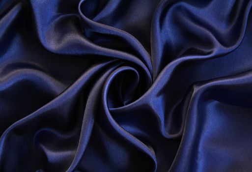 Smooth elegant dark blue silk can use as background 