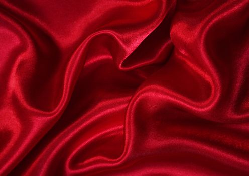 Smooth elegant red silk can use as background 