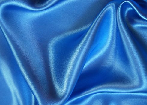 Smooth elegant blue silk can use as background 