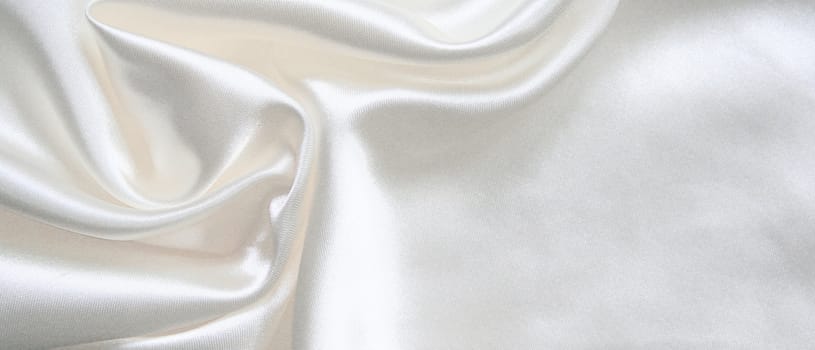 Smooth elegant white silk can use as wedding background 