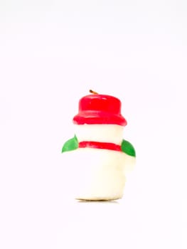 Back of christmas snow doll candle isolated on white background