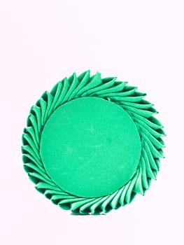 A miniature of Thai traditional tray made from green silk isolated on white background