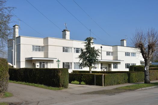 Row of two storey white  flats