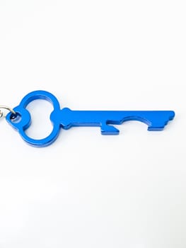 A blue stainless steel key's keychain isolated on white background