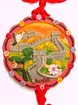 Great wall of China bas relief pendant isolated on white background