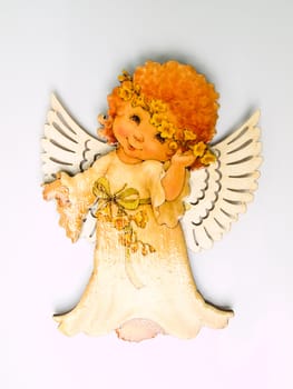 A child angel magnet isolated on white background