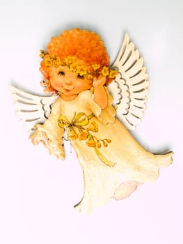 A child angel magnet isolated on white background