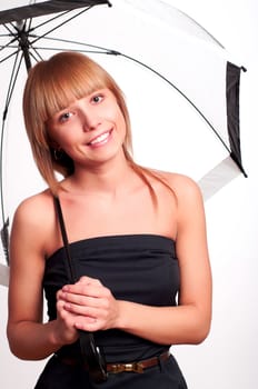 Young fashionable woman smile and holding umbrella