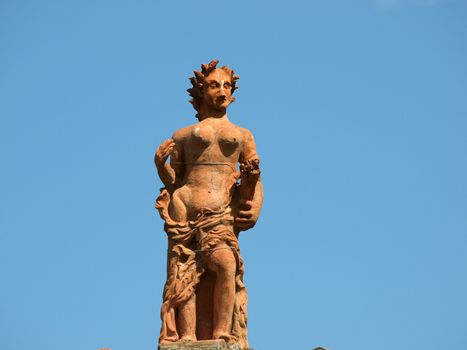 Florence - a sculpture on the roof of the museum of porcelain in the gardens of Boboli