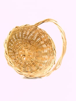 Empty wicker basket isolated on white