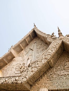 Gable white stucco in city pillar shrine, wat Mingmuaeng Nan Thailand
any kind of art decorated in Buddhist church, temple etc.They are public domain or treasure of Buddhism, no restrict in copy of use.