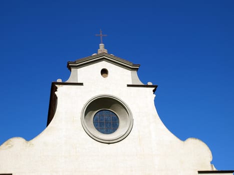 Florence - bright sunlight of beautiful shapes of the Santo Spirito facade