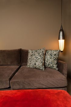 Corner of two seated sofa nice dark ambience