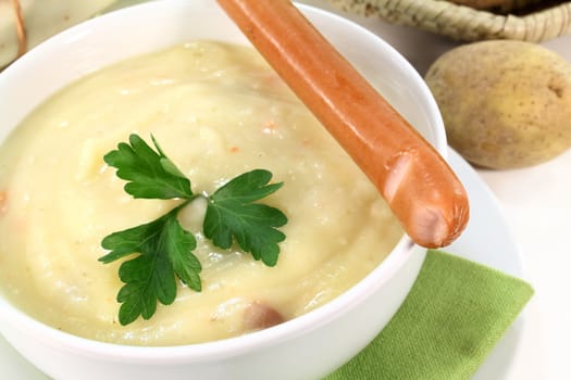 Cream of potato soup with bacon and vegetables