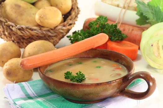 Cream of potato soup with bacon and vegetables