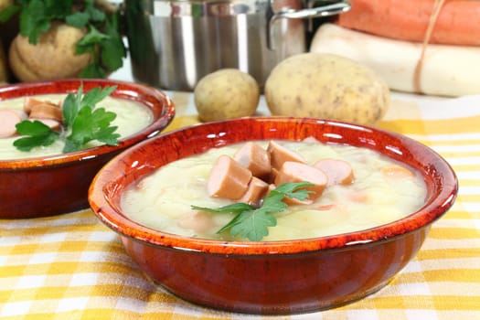 Cream of potato soup with bacon and vegetables