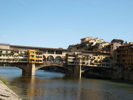 The Ponte Vecchio /Old Bridge/ is a Medieval bridge over the Arno River, in Florence, Italy