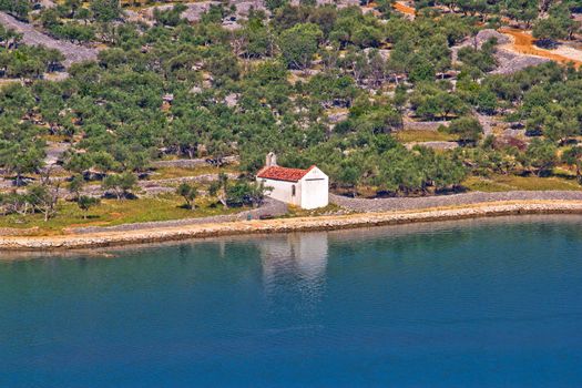 Mediterranean style chapel made of stone by the sea, Island Cres, Croatia
