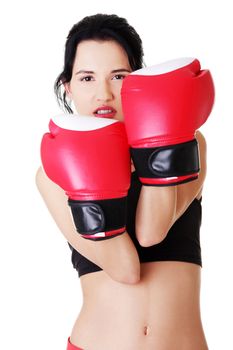 Boxing fitness woman wearing red boxing gloves. Isolated on white.