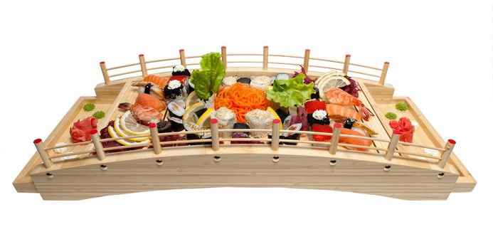 Set of sushi on wooden stand in the form of the bridge isolated on white