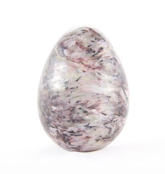 charoite in the form of egg on light background