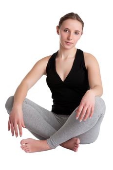 Woman sitting on the floor, resting, isolated in a white background