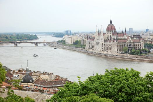 Parliament of Hungary on the riverside of Danube river, Budapest cityscape.