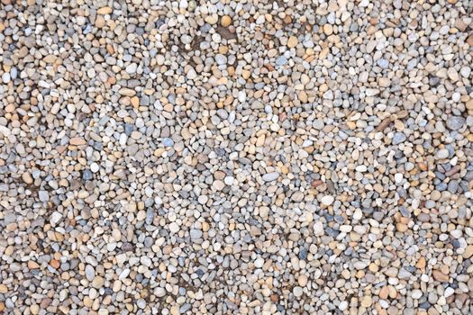 Lot of pebble stone as textured background.