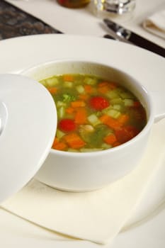 Vegetable soup served in a cup at restaurant