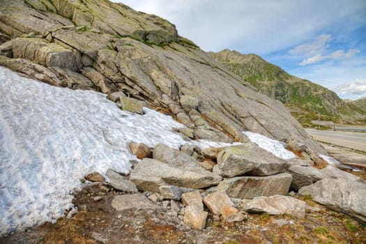Melting snow in summer, swiss Alps, Europe.