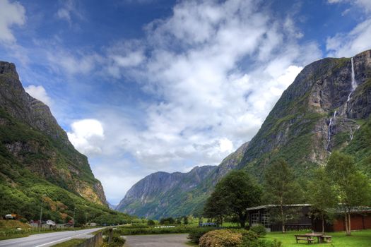 Small camping and picturesque landscape of norwegian mountains, scandinavian Europe.