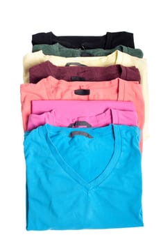 Group of multicolored t-shirts isolated on white