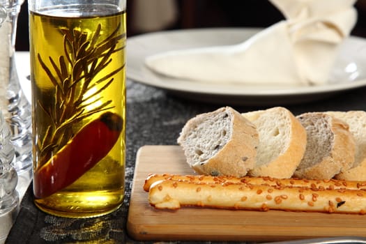 Fresh bread with olive oil and rosemary