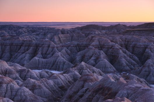 A labyrinth of ravines and ridges at sunset, Badlands National Park, South Dakota, USA