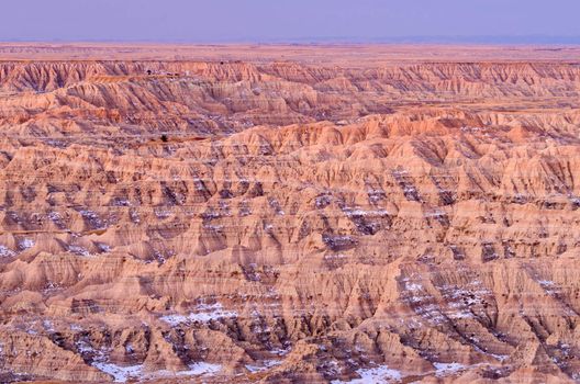 A labyrinth of ravines and ridges at sunrise, Badlands National Park, South Dakota, USA