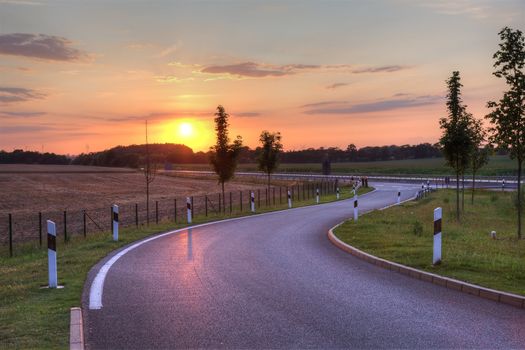 Picturesque sunset on highway in Netherlands, Europe.