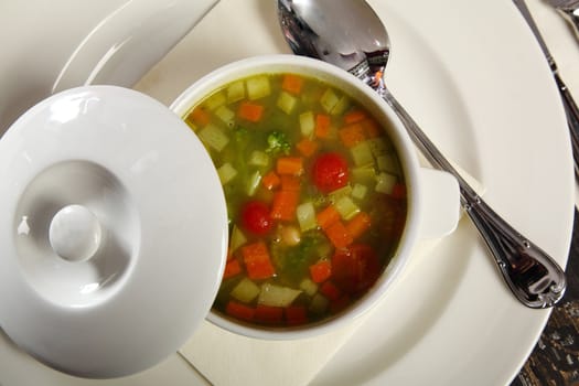 Vegetable soup served in a cup at restaurant