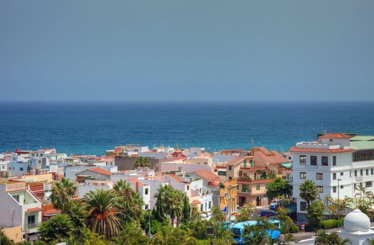 Shoreline of Atlantic ocean, cityscape view of Tenerife island.
