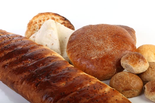 Fresh different type of bread on white background